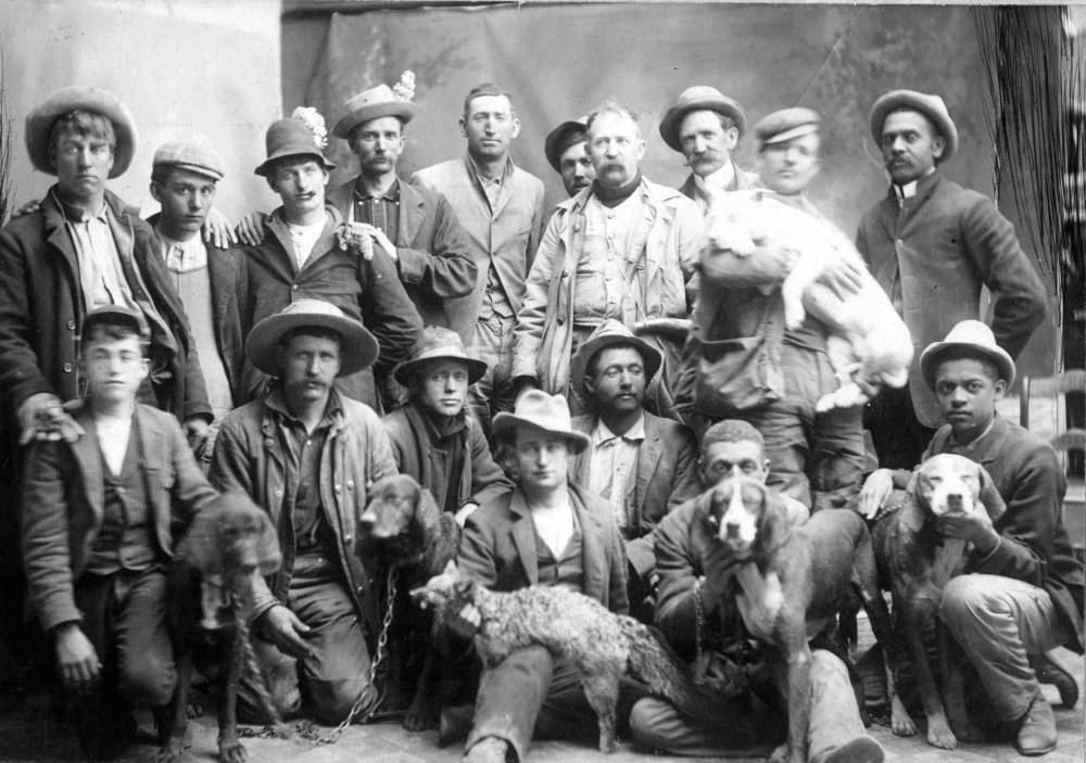 Group of Men with Hunting Dogs and Fox.